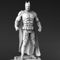 A detailed 3D model of a superhero in armor with a cape, standing on a small platform.