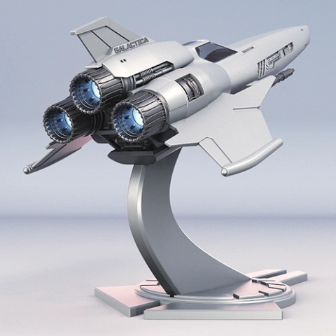 Futuristic spacecraft model on a display stand, featuring sleek wings and triple rear engines.
